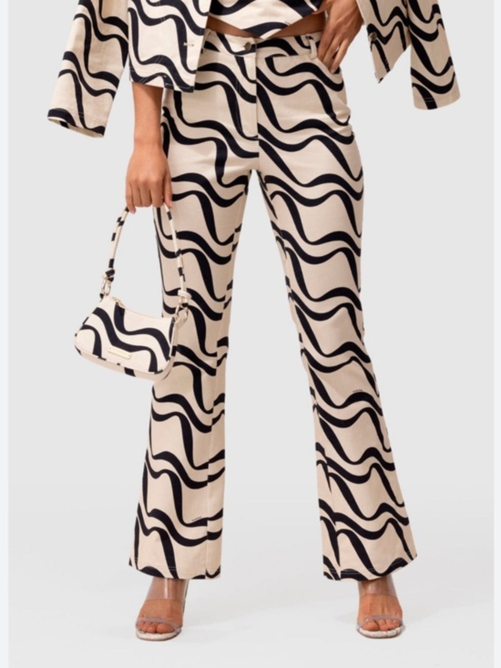 The Wolf Gang Dress Moscoso Wavy Bootcut in Cream Black
